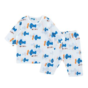 Child wearing Airplane Jacquard 7/8 Sleeve PJ Set featuring colorful airplane patterns on a soft blue background.