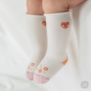 Adorable Shudy Rolling Baby Knee Socks featuring a playful clover pattern on a soft, stretchable fabric, perfect for toddlers on the move