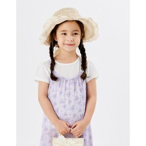 Young girl wearing a lavender floral dress with frills, paired with a white t-shirt and a straw hat, exuding summer elegance and charm.