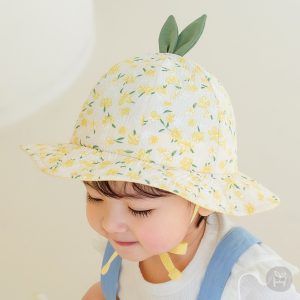 Jini Baby Girl Sun Hat featured in a serene setting, highlighting its floral design and lightweight structure, ideal for baby’s summer outings. Available now at Tiny You Baby Store